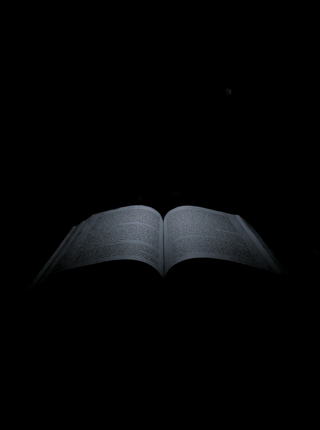 open mystery book at night