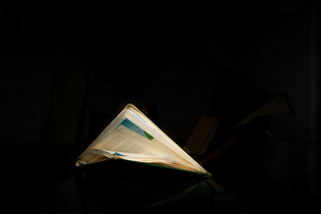 open mystery book at night